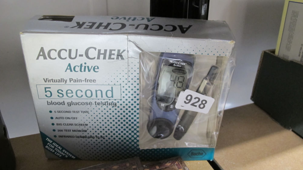 Lot 928: Accu chek blood glucose monitor