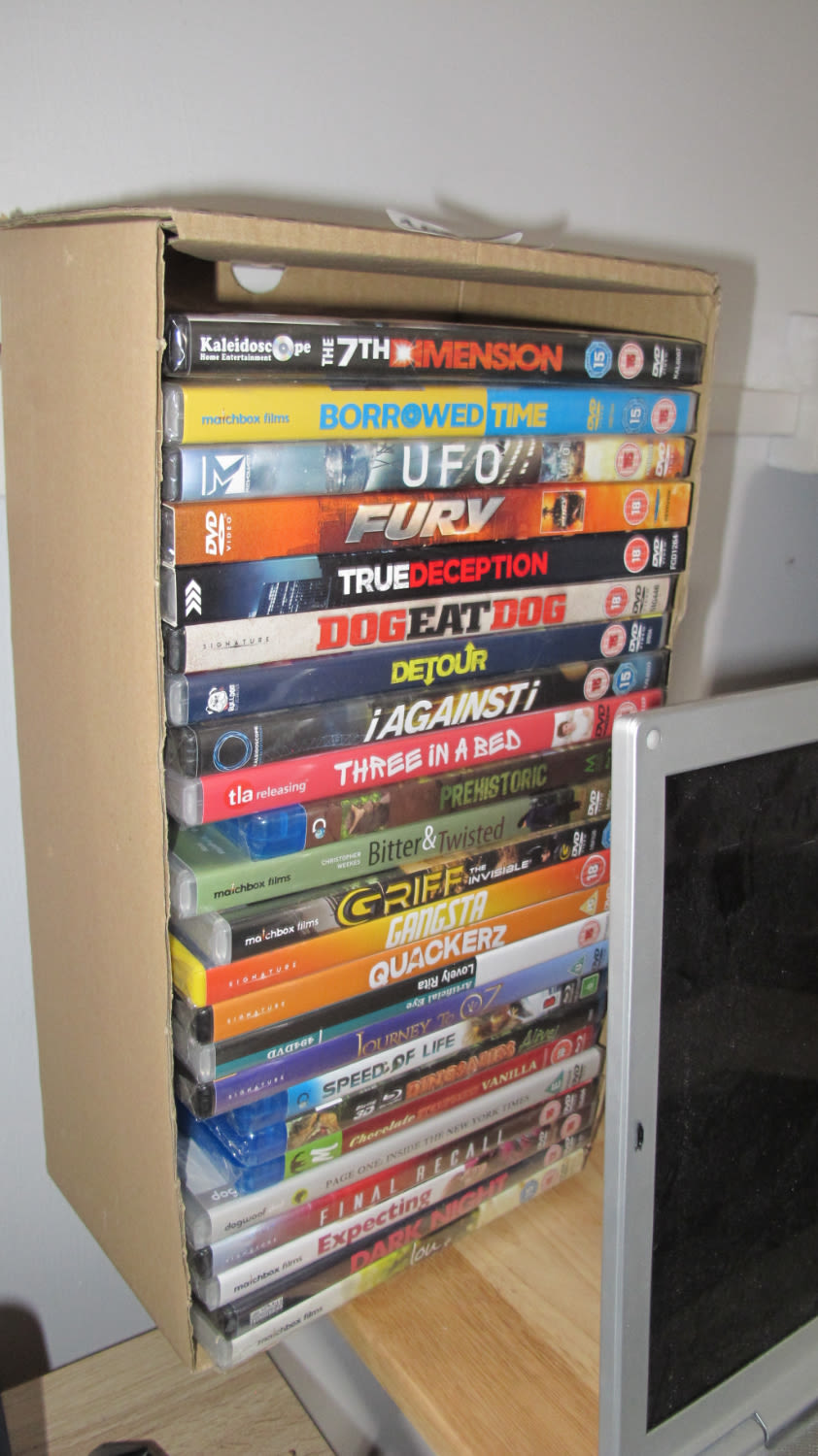 Lot 1073: Box of 24 brand new DVDs various titles