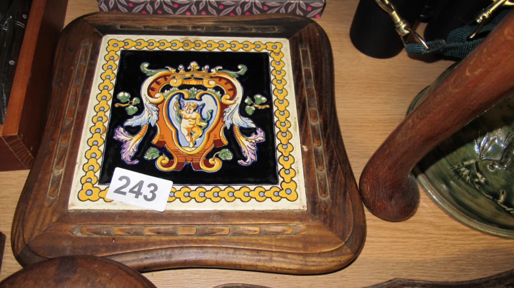 Lot 243: French tile trivet