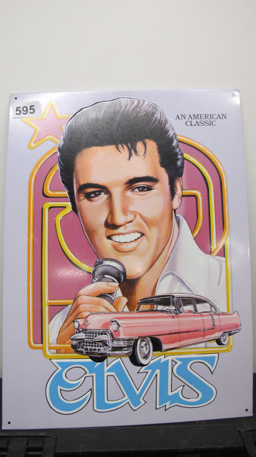 Lot 595: Elvis metal sign, snap this up if you...