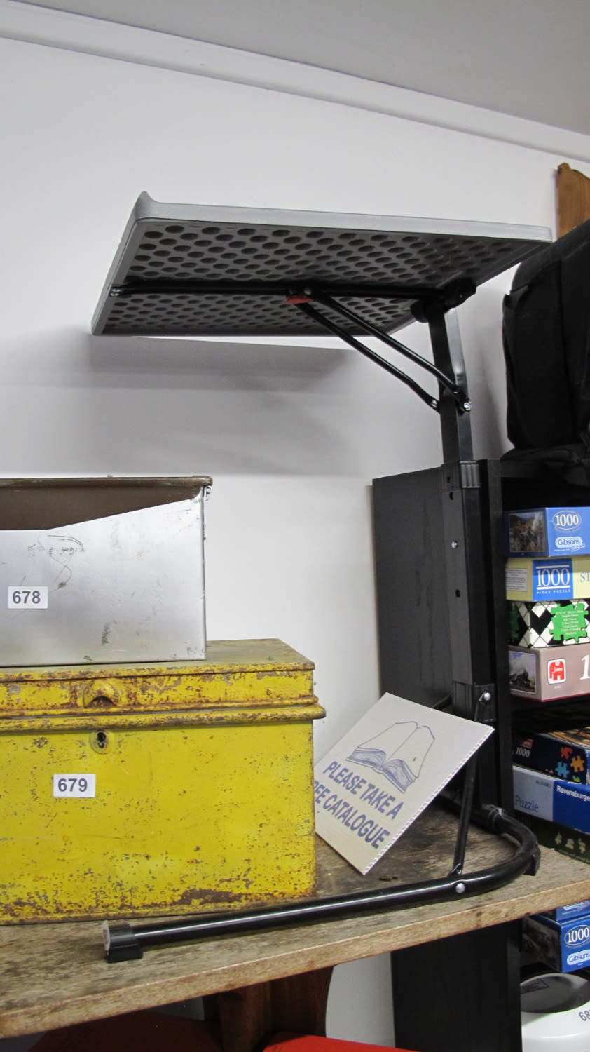 Lot 680: A portable projector stand