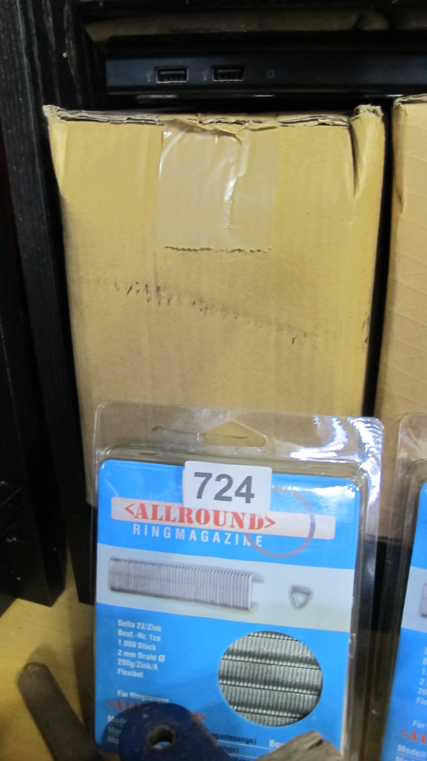 Lot 724: A box of fencing staples