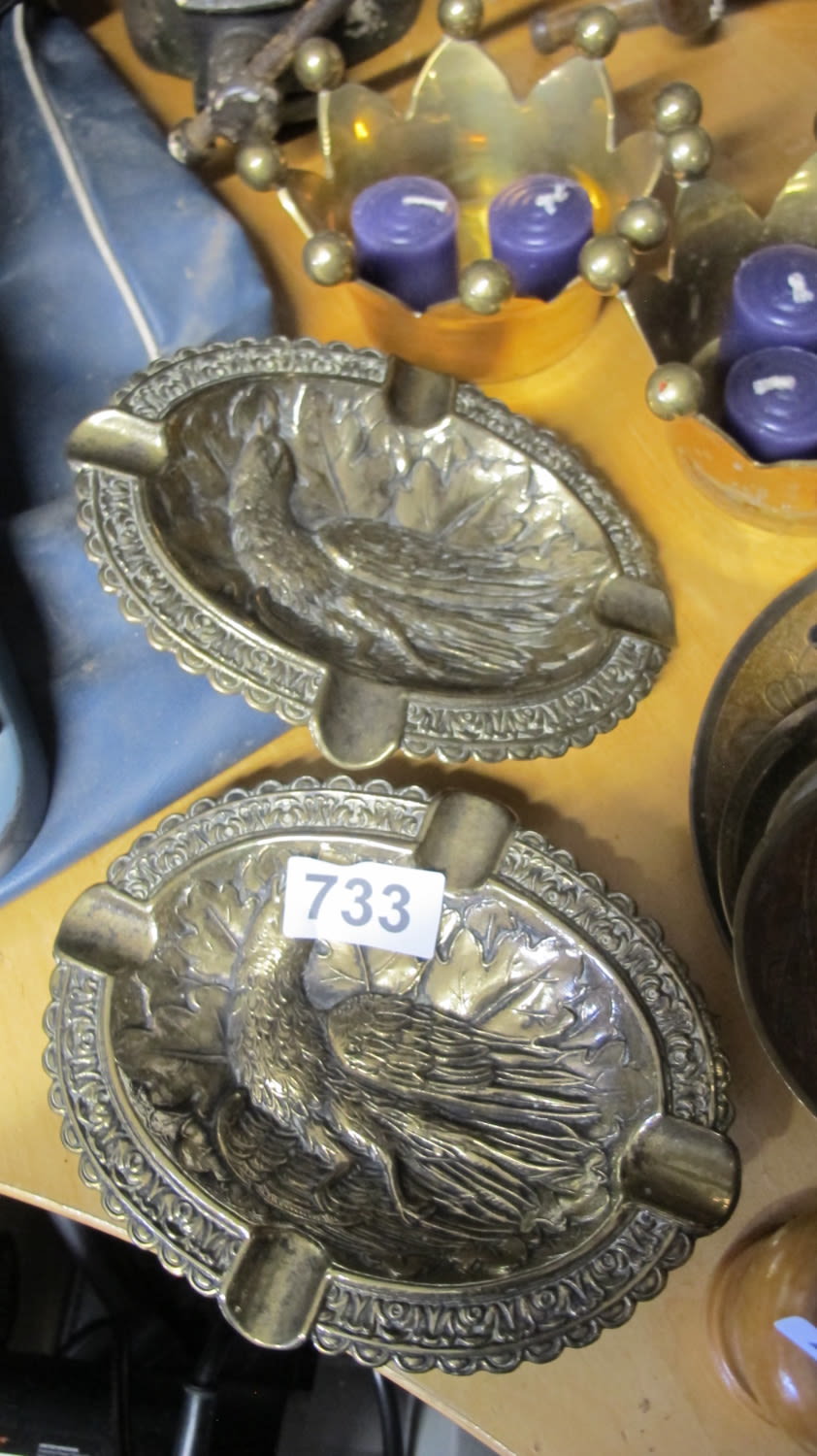 Lot 733: 2 white metal bird ashtrays