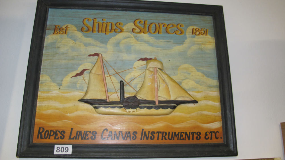 Lot 809: Framed Ships Stores sign