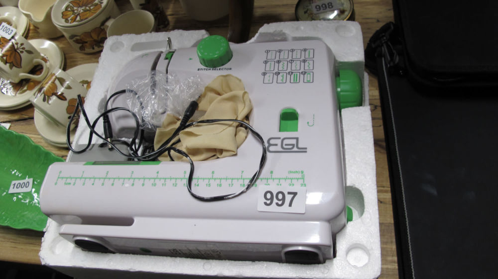 Lot 997: EGL mini sewing machine