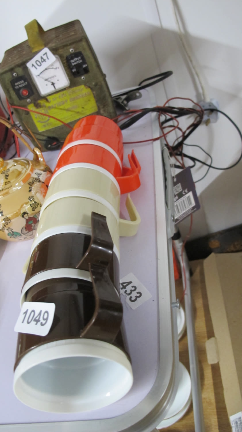 Lot 1049: Stacking plastic cups