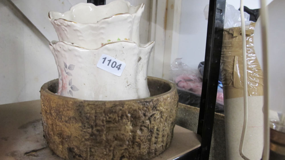 Lot 1104: vases and a planter