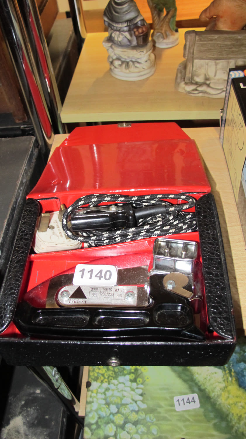 Lot 1140: Vintage fold away travel iron