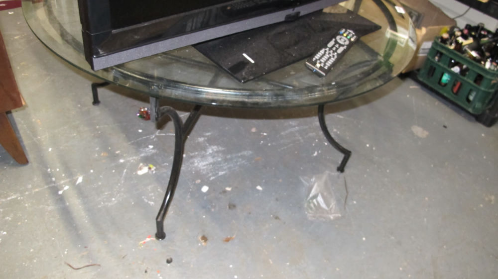 Lot 1164: Glass table with metal base