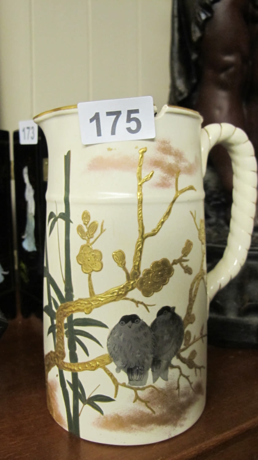 Lot 175: Hand painted and gilded vintage oriental jug
