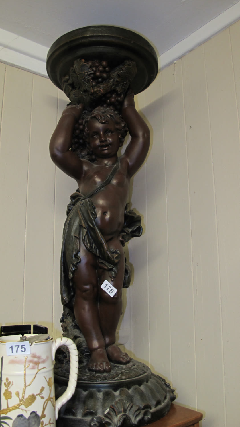 Lot 176: Large putti plant stand