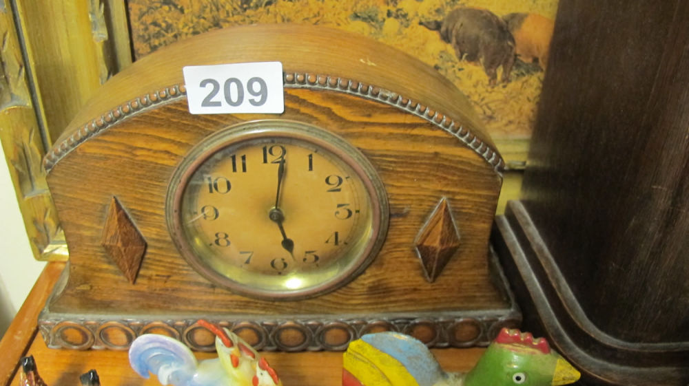 Lot 209: Vintage wooden mantel clock