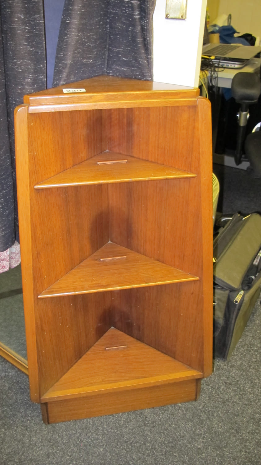 Lot 239: Teak G plan mid century corner shelves