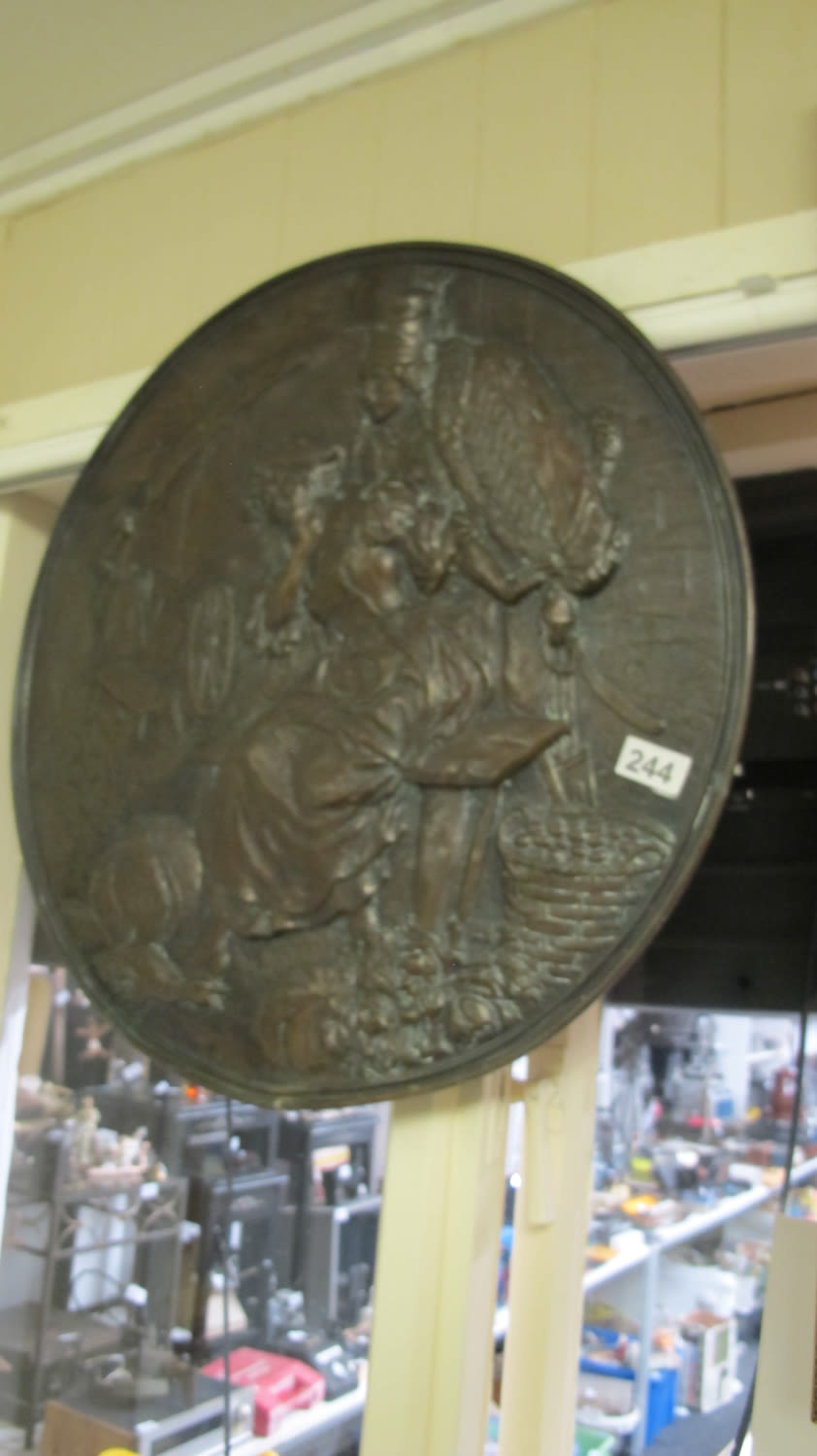 Lot 244: antique brass plaque