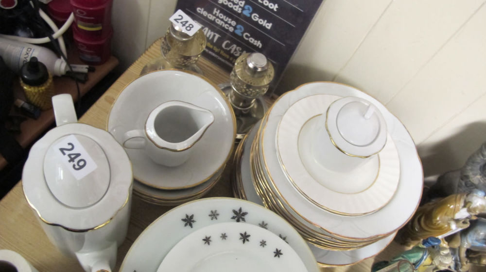 Lot 249: gilt edged part dinner service
