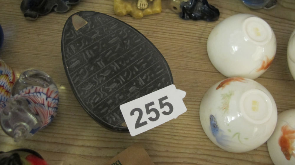 Lot 255: unusual stone Egyptian scarab with hieroglyphic markings