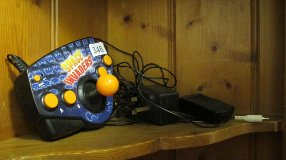 Lot 346: space invaders tv game
