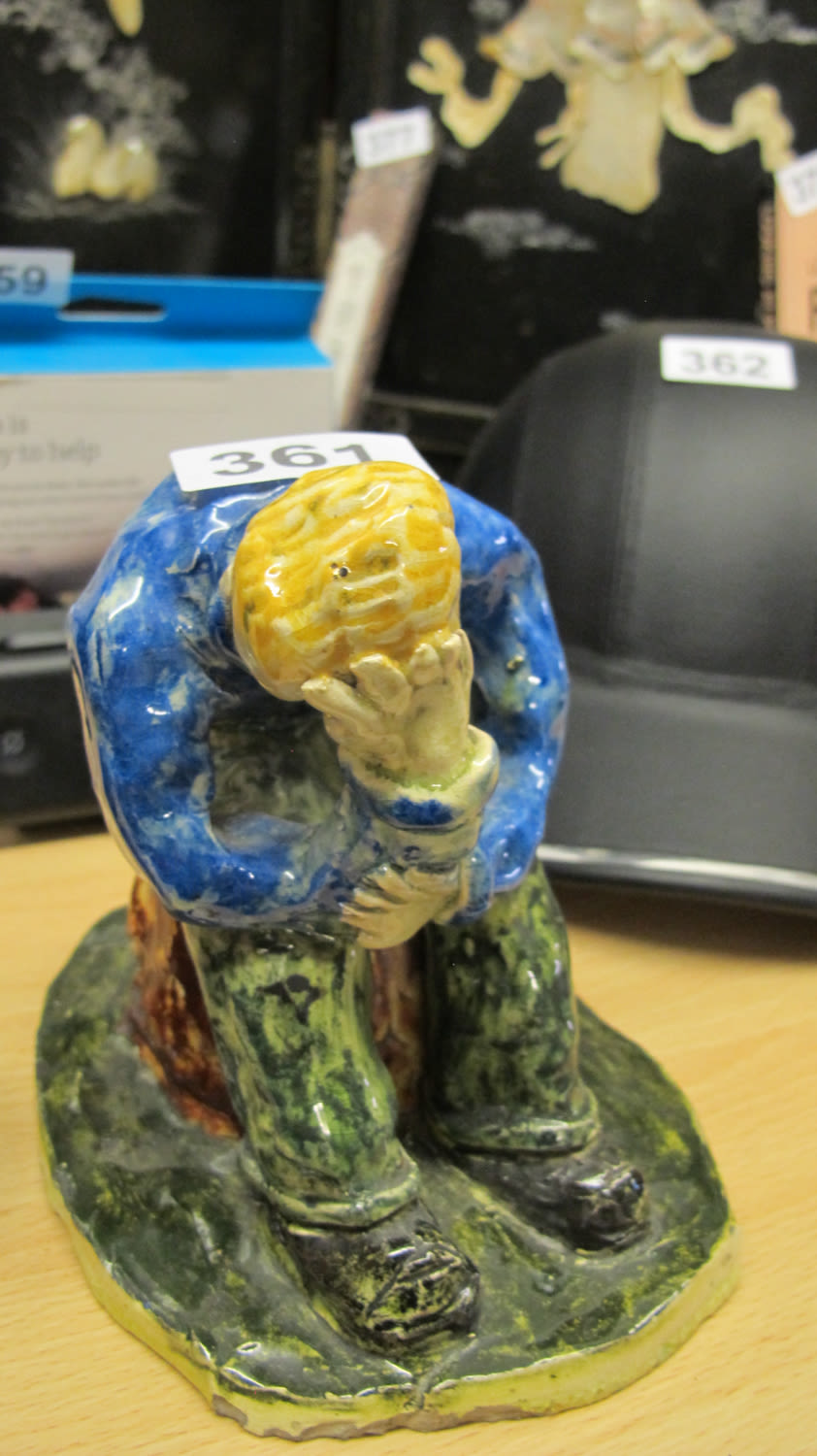 Lot 361: studio pottery figure of a stressed mardy Ginger...