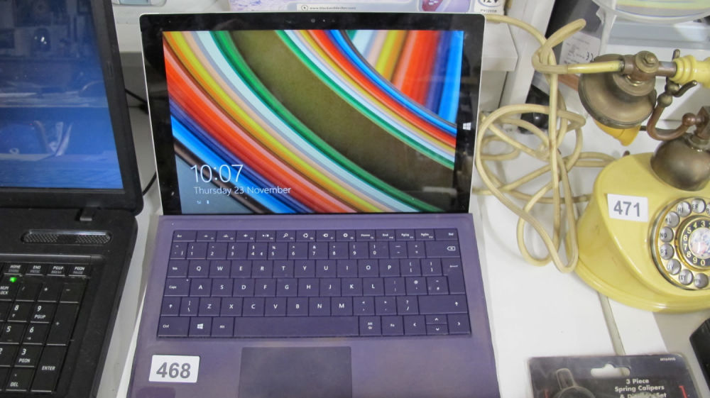 Lot 468: Microsoft Windows 8 Surface Pro laptop in good...