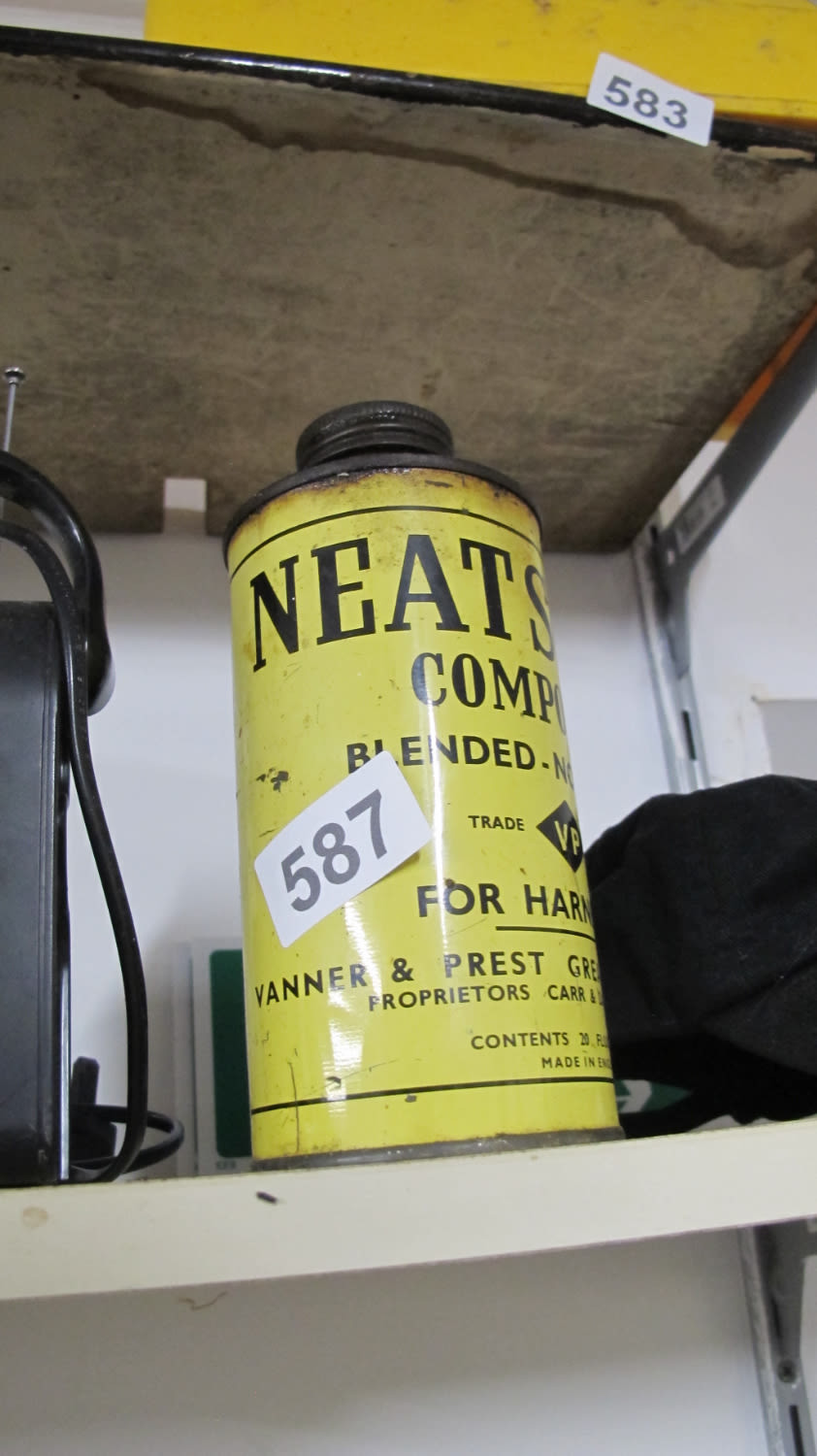 Lot 587: vintage tin of Neats horse harness treatment