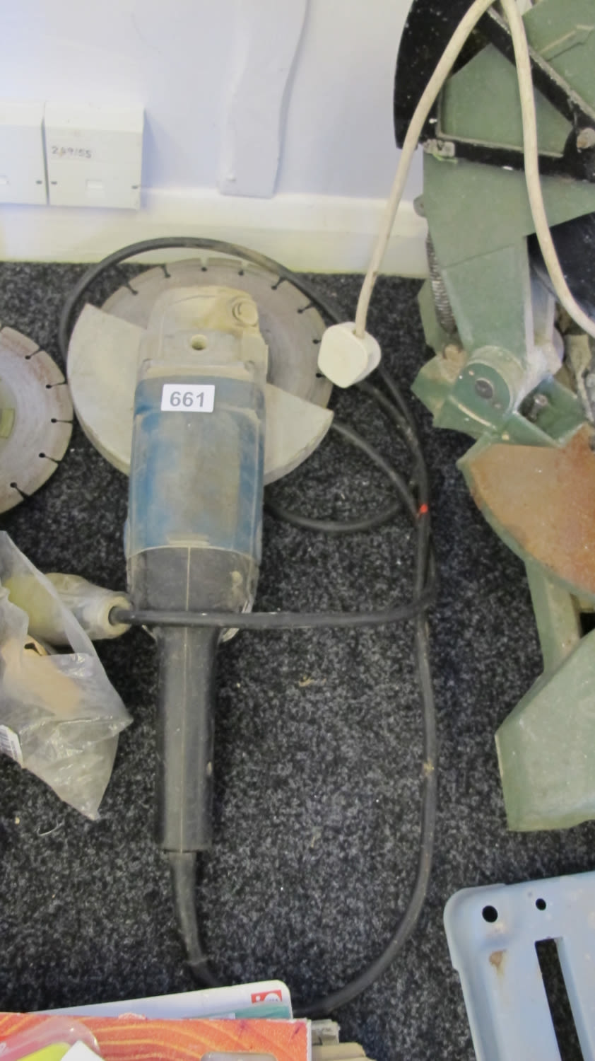 Lot 661: A large Makita 9 inch angle grinder
