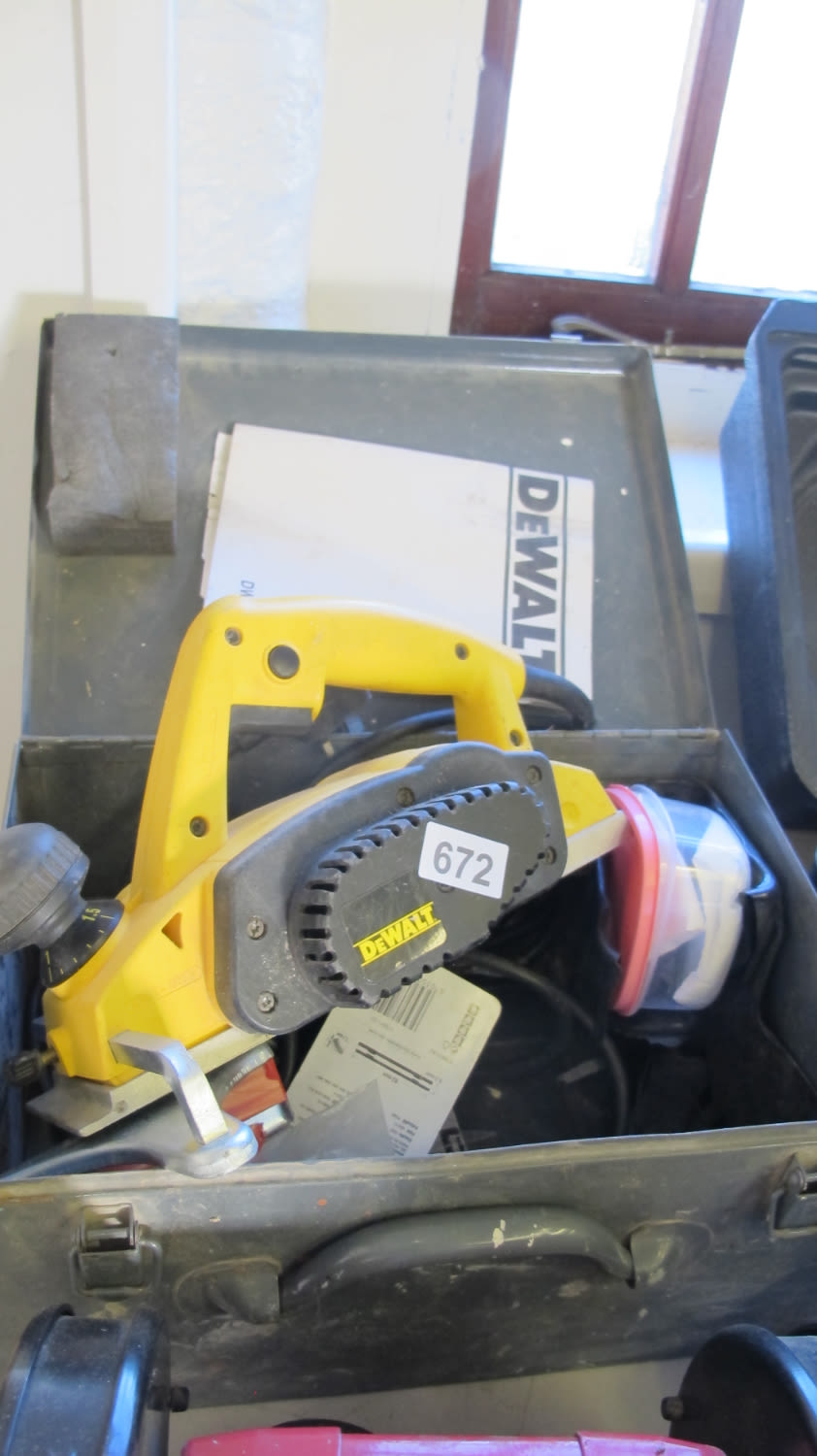 Lot 672: top of the range DeWalt electric planer