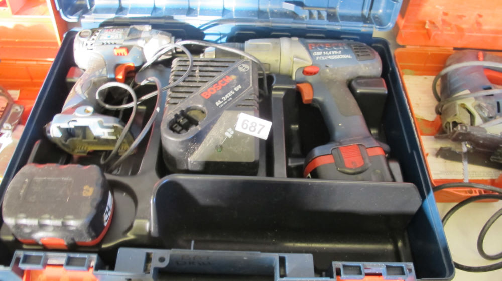 Lot 687: Bosch battery screwdriver and battery drill