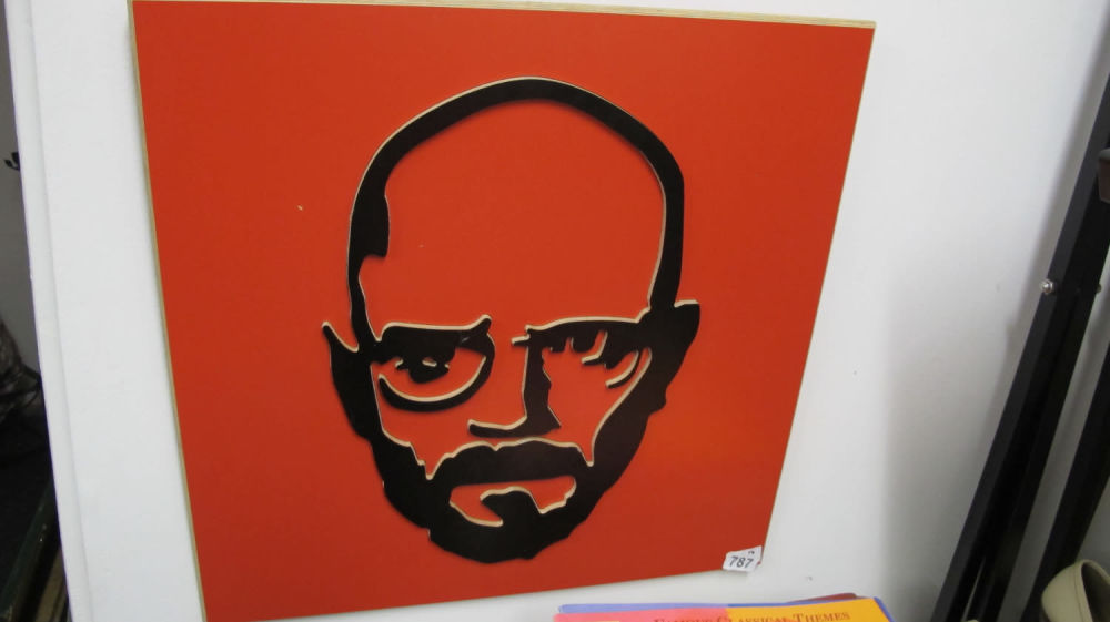 Lot 787: Wood wall art of Clive Sinclair in his...