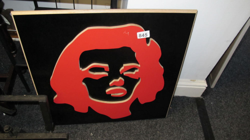 Lot 845: Wooden wall art of Mick JAgger