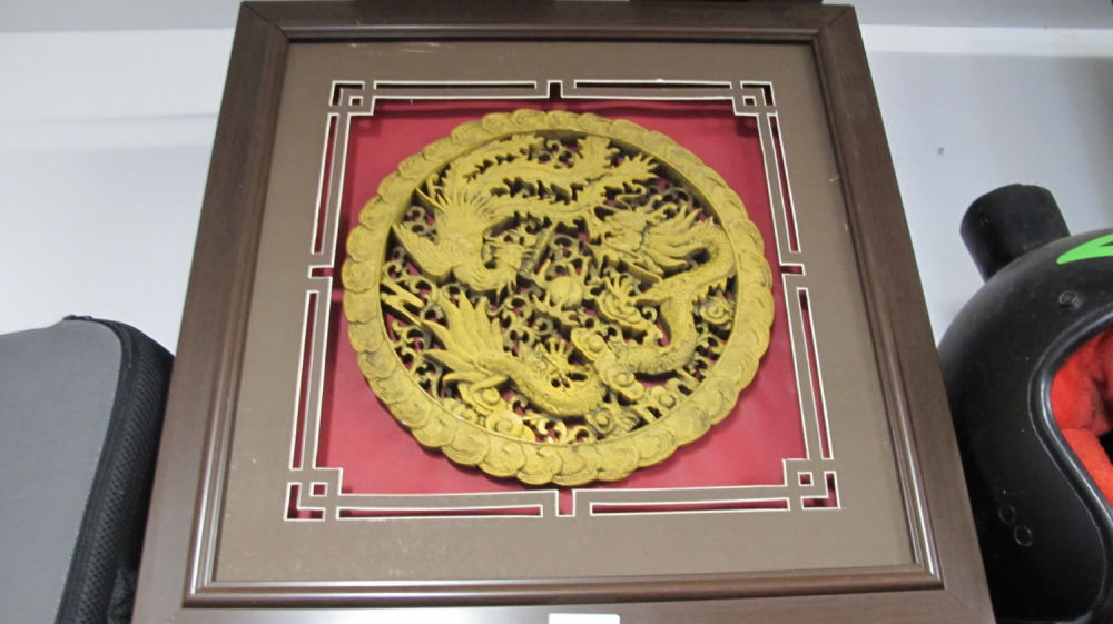 Lot 919: Oriental relief wall art