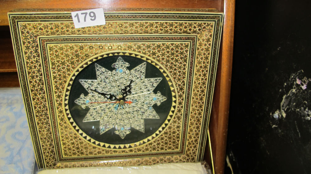 Lot 179: Islamic style wall clock