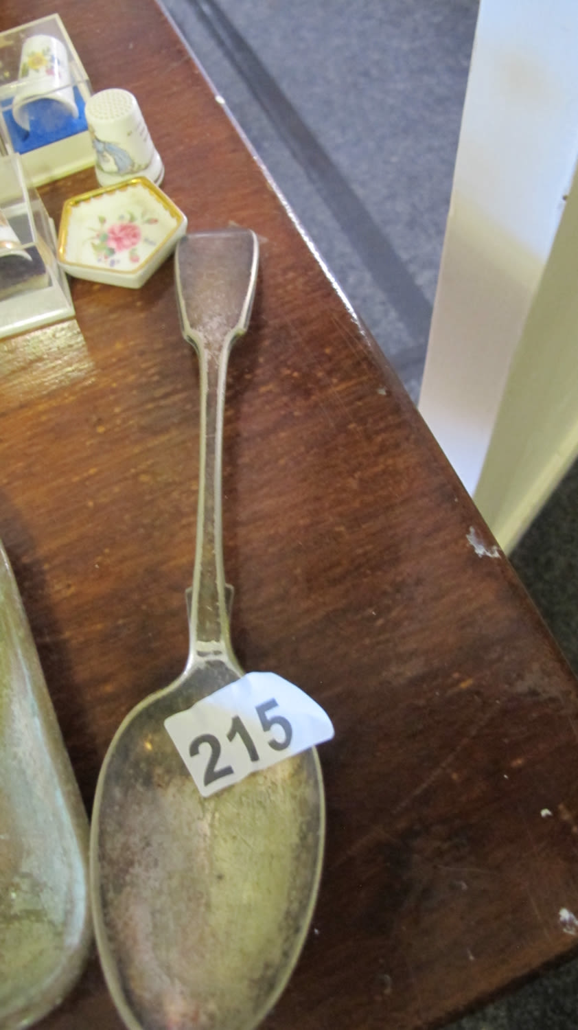 Lot 215: Large antique silver plated serving spoon
