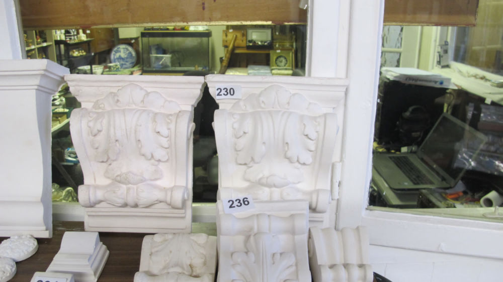 Lot 230: a pair of plaster corbels dimensions are height...