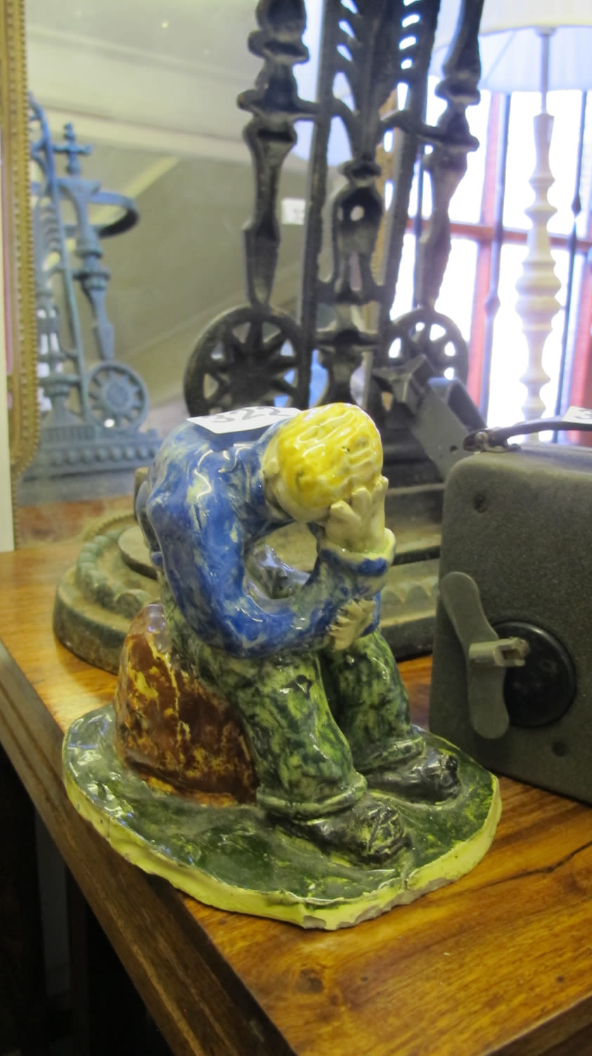 Lot 322: Studio pottery model of Phill looking at the...