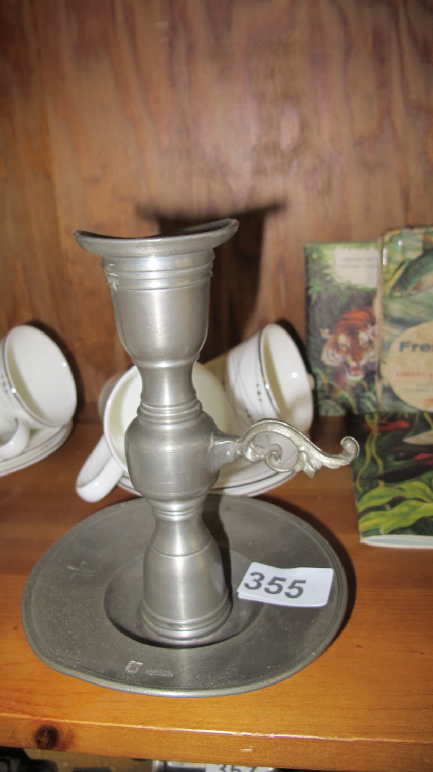 Lot 355: Pewter candlestick