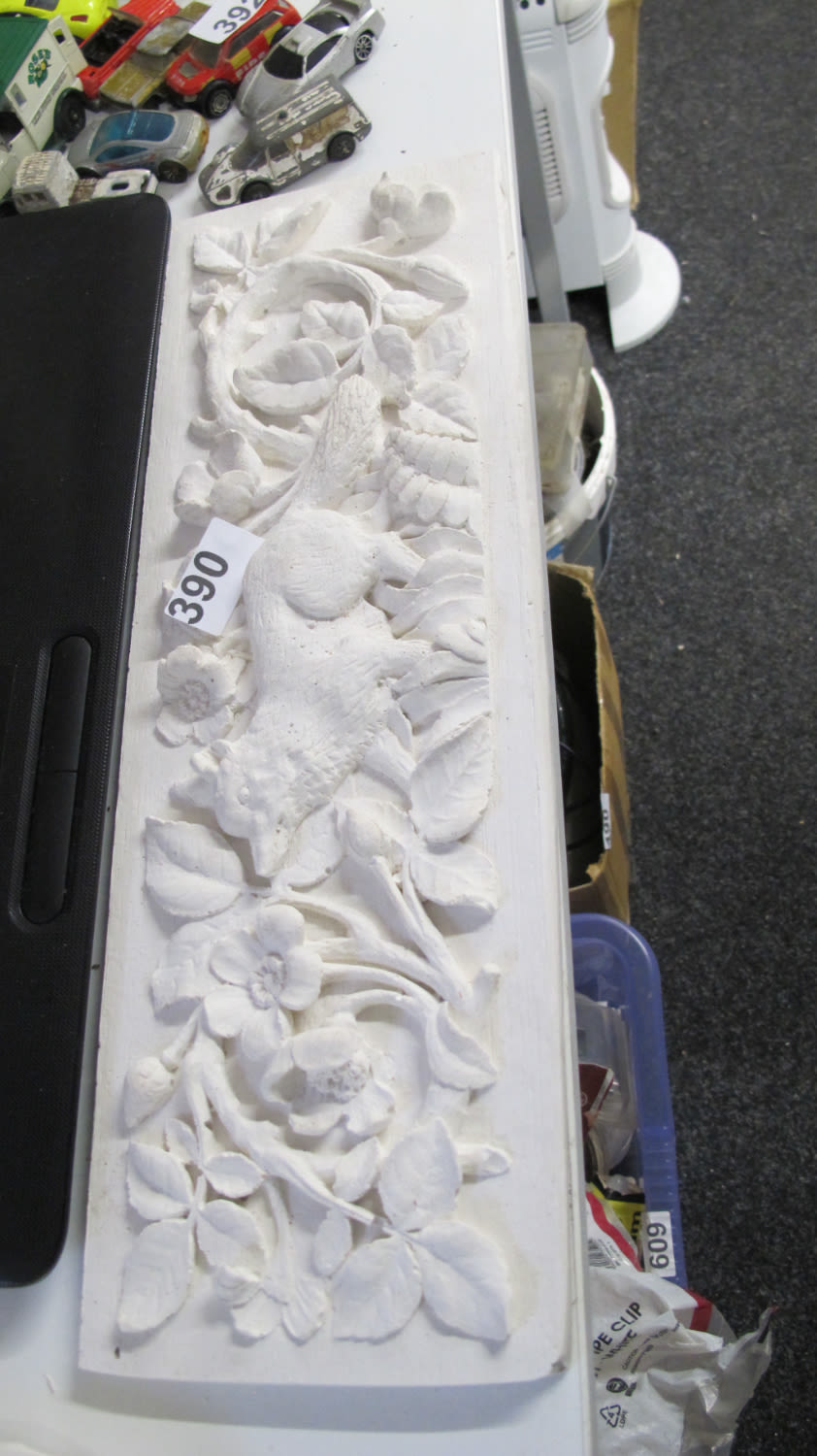 Lot 390: A decorative plaster wall plaque of a fox...