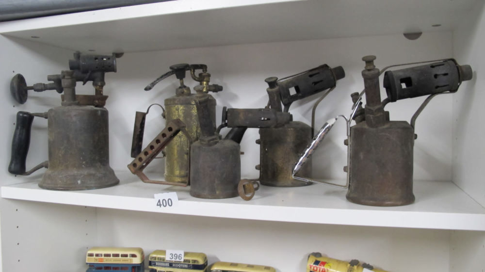 Lot 400: A quantity of brass blow lamps