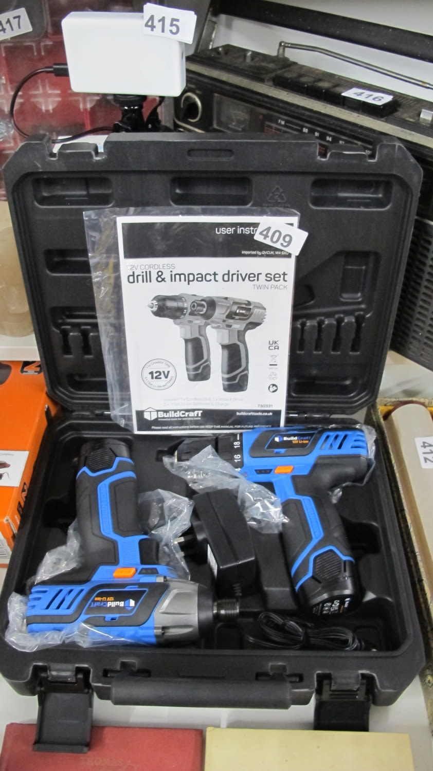 Lot 409: Drill and impact driver set
