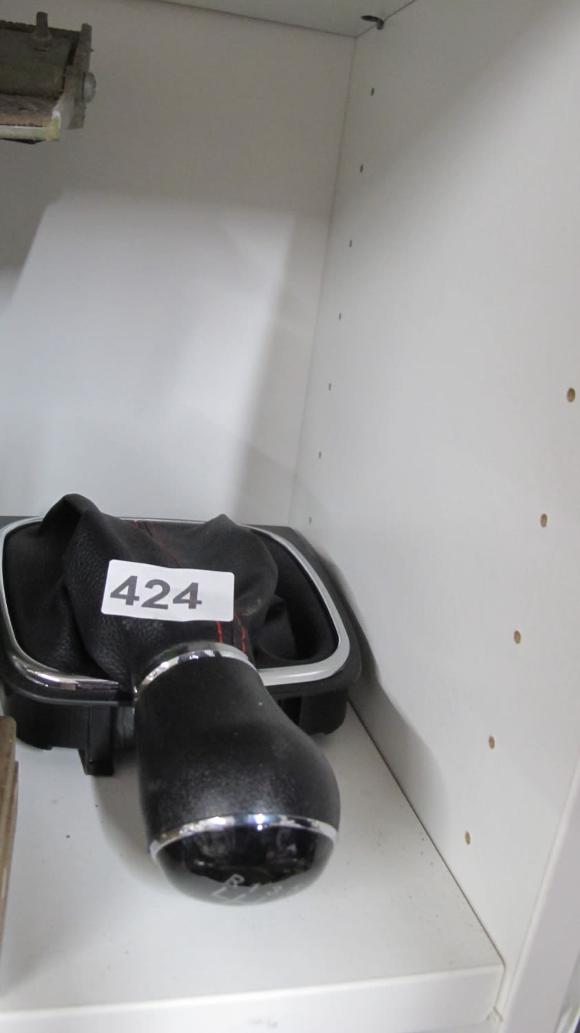 Lot 424: A gearstick. For buying your car in 437...
