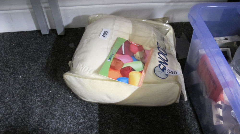 Lot 489: A pillow