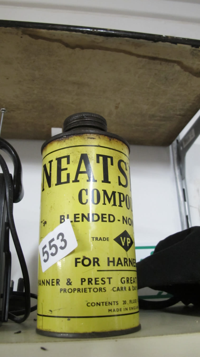Lot 553: A bottle of oil for horse harnesses