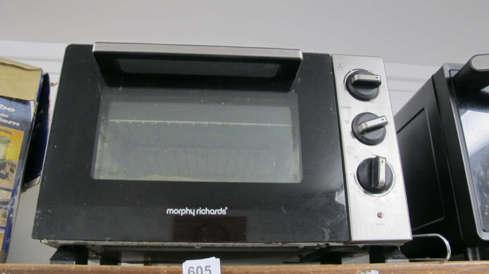 Lot 605: morphy richards multi cooker