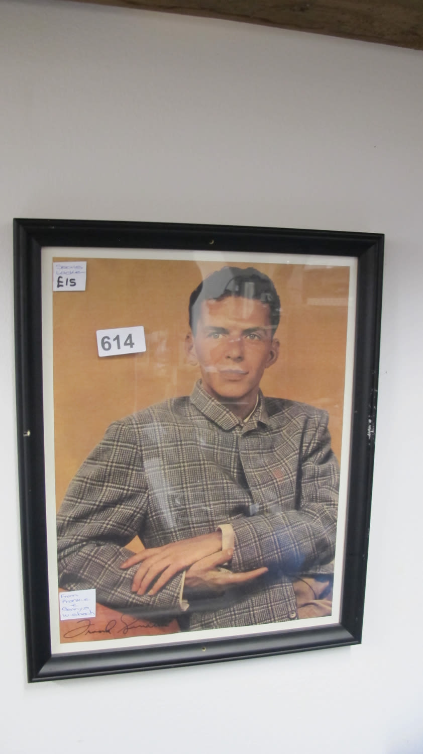 Lot 614: framed and glazed picture from Frankie & Benny's
