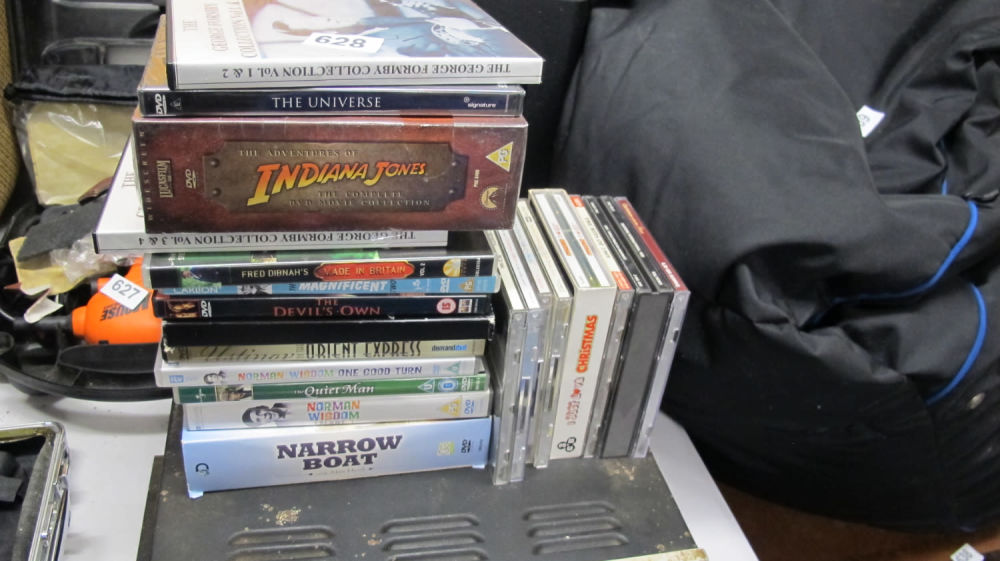Lot 628: various DVDs and Cds