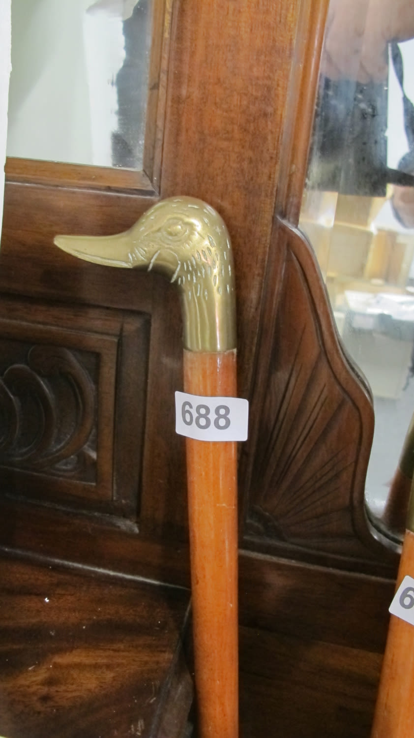 Lot 688: Brass duck handled walking stick