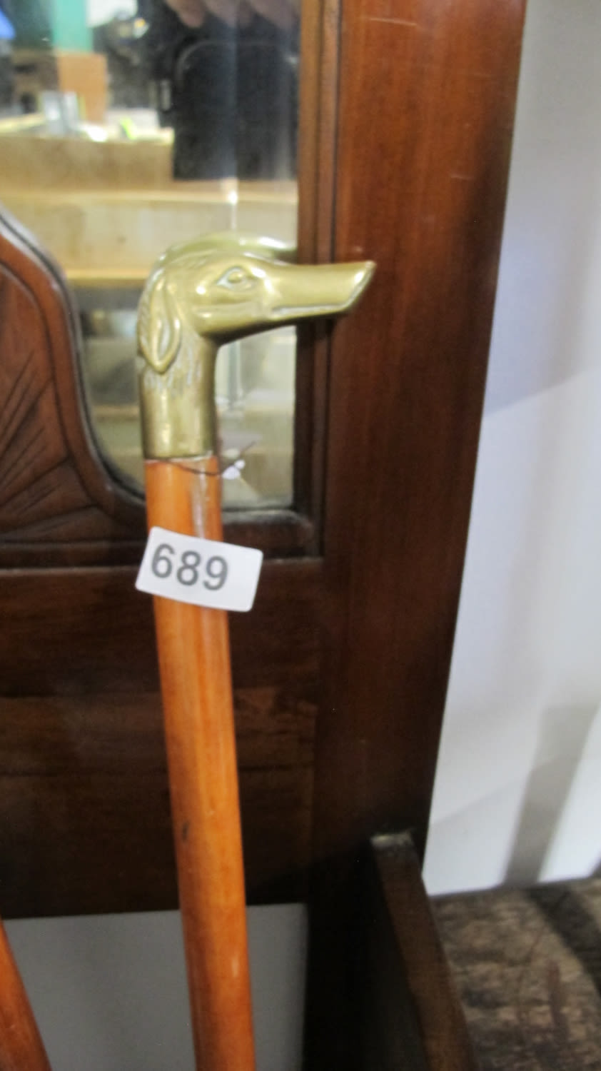 Lot 689: Brass dog handled walking stick