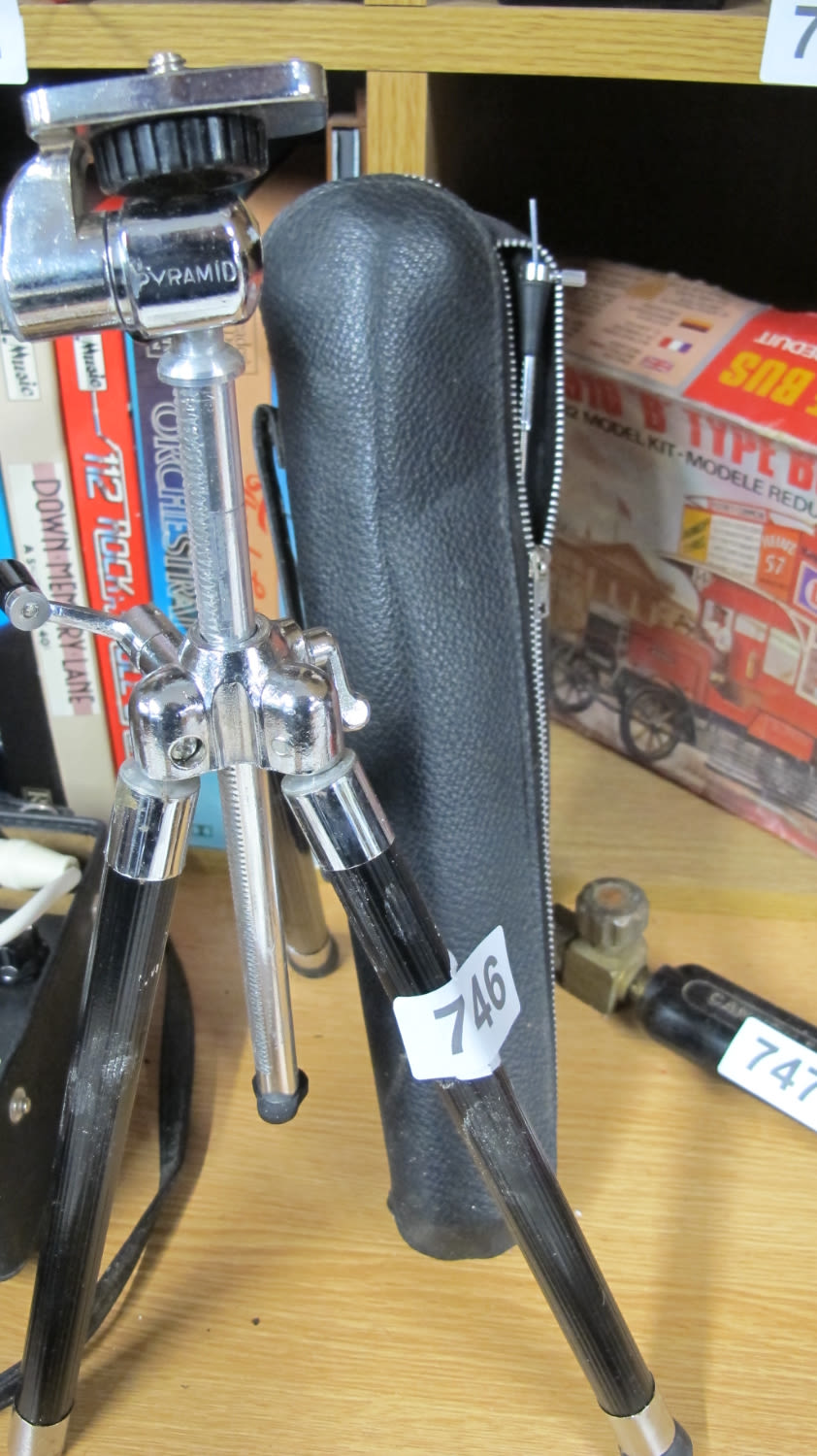 Lot 746: Vintage camera tripod