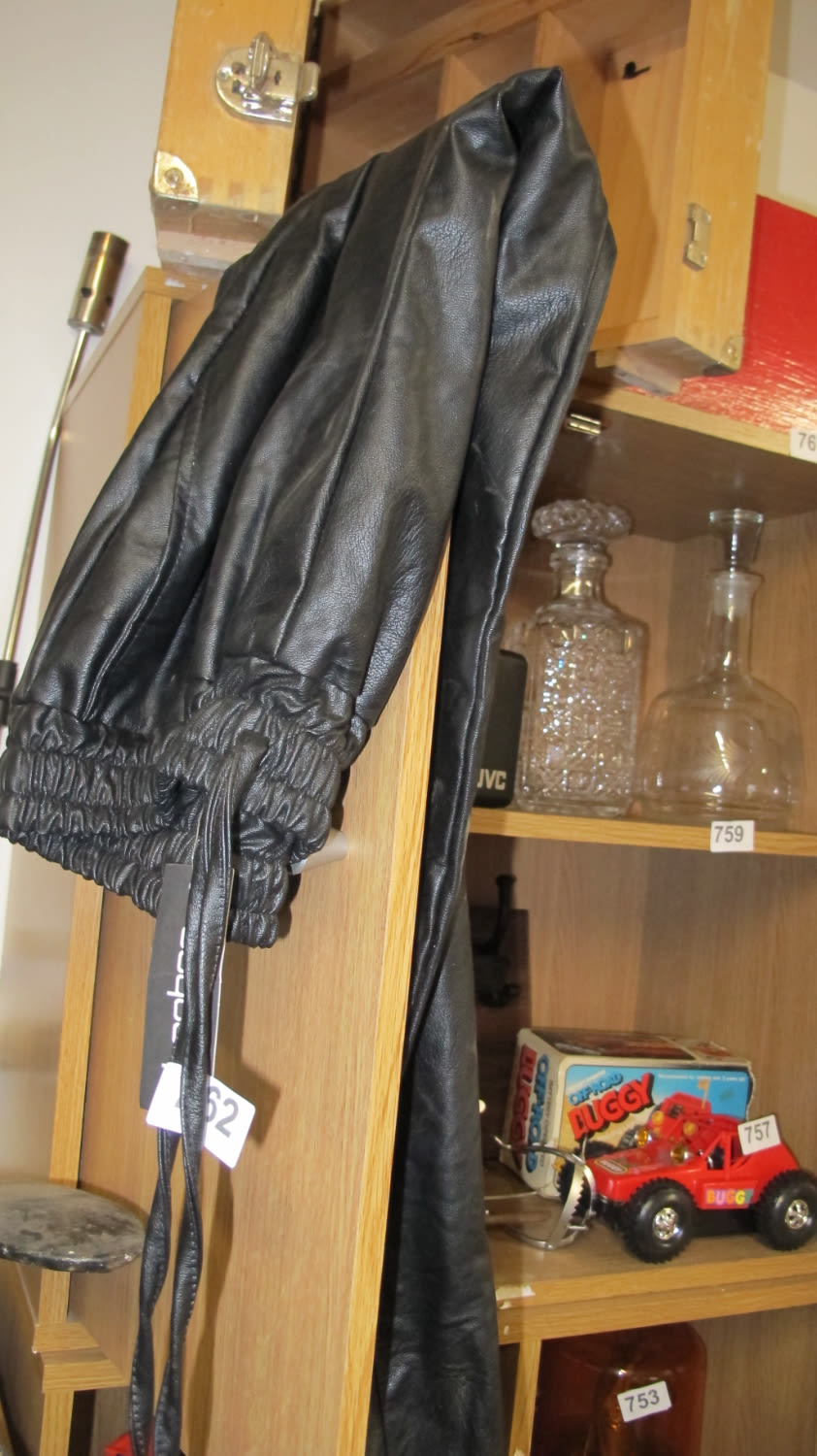 Lot 762: Leather? Trousers?