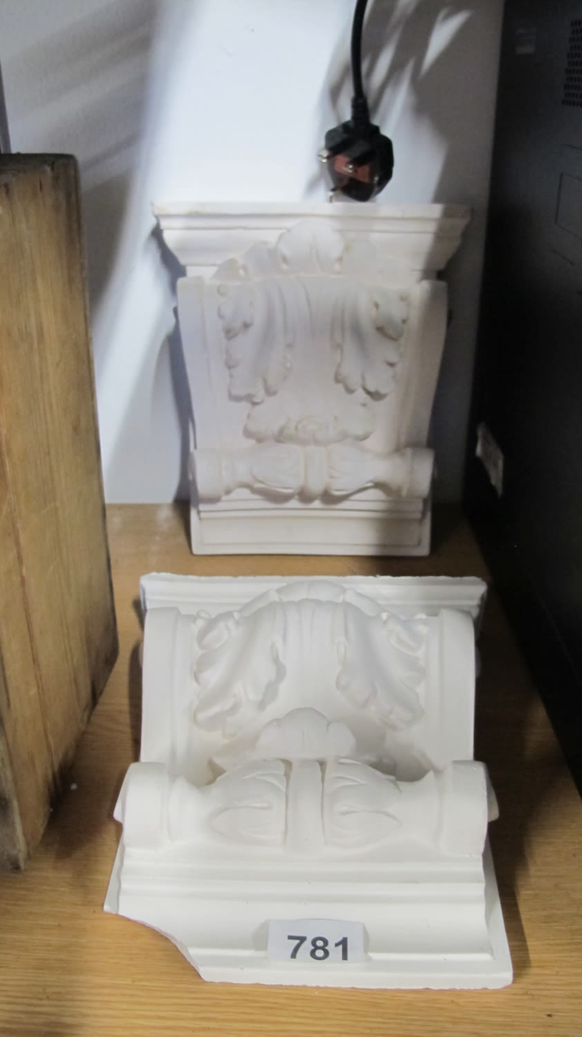Lot 781: a pair of plaster corbels dimensions are height...