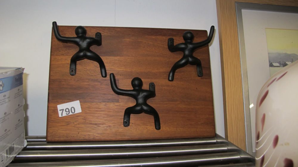 Lot 790: Pert buttocks coat hooks